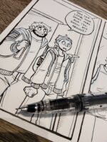 Photo of a Dead City page on a table with a fountain pen overtop of the page.